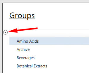 A red arrow points at the small carrot symbol under Groups in Genesis R&D Supplements.